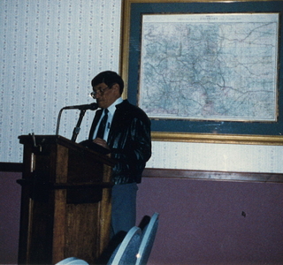  Robert Gopher at the podium speaking at the premier screening of Indian Tears of Love