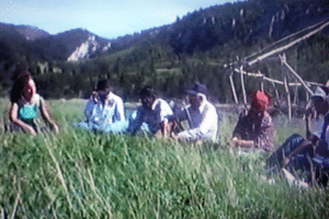 group gathered in a circle talk at Ft. Belknap