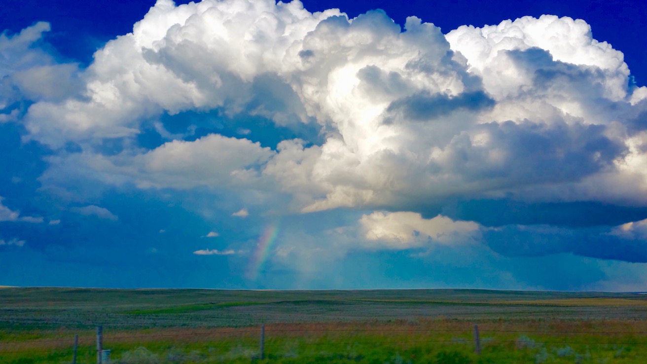  Huge clouds with rainbow