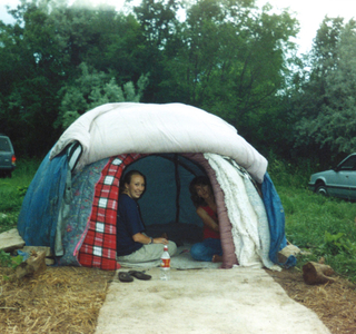  Two visitors sitting in the Sweat Lodge 