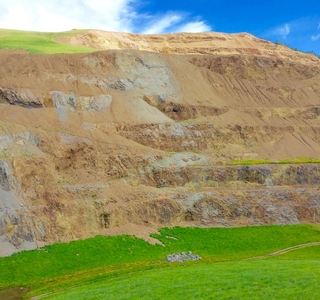 close up view of the side of the mined mountain damage